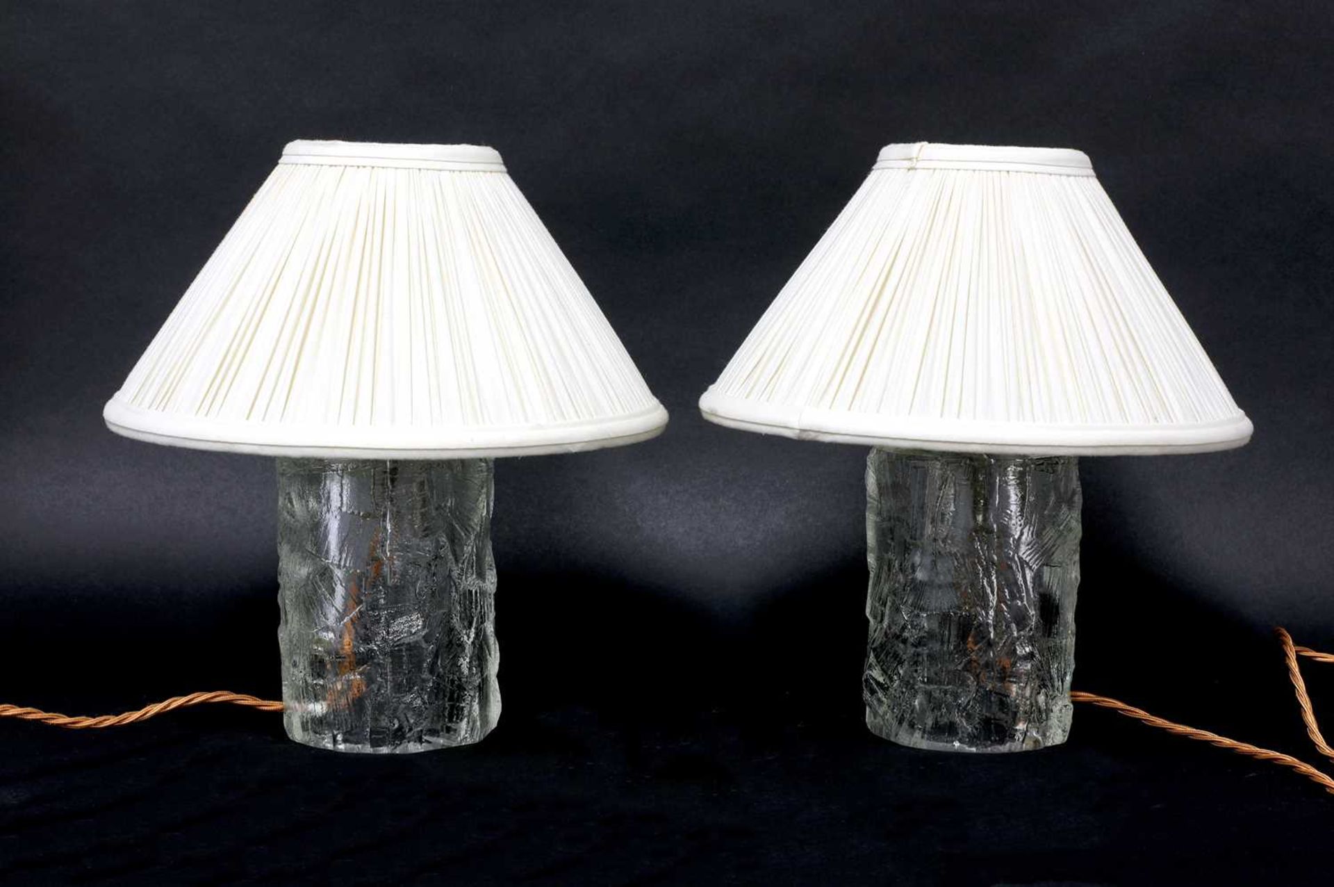 A pair of heavy glass table lamp bases,