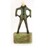 An Art Deco cold-painted bronze and ivory figure of a Pierrot,