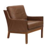 A Danish rosewood and brown leather armchair, §