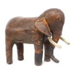 A leather elephant footstool,