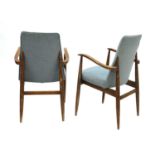 A pair of beech armchairs,