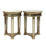 A pair of gold painted and mirrored side tables,