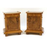 A pair of Art Deco walnut bedside cupboards,