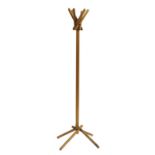 A beechwood coat and hat stand,