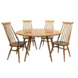 An Ercol drop-leaf dining table,
