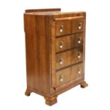 An Art Deco walnut chest of drawers,