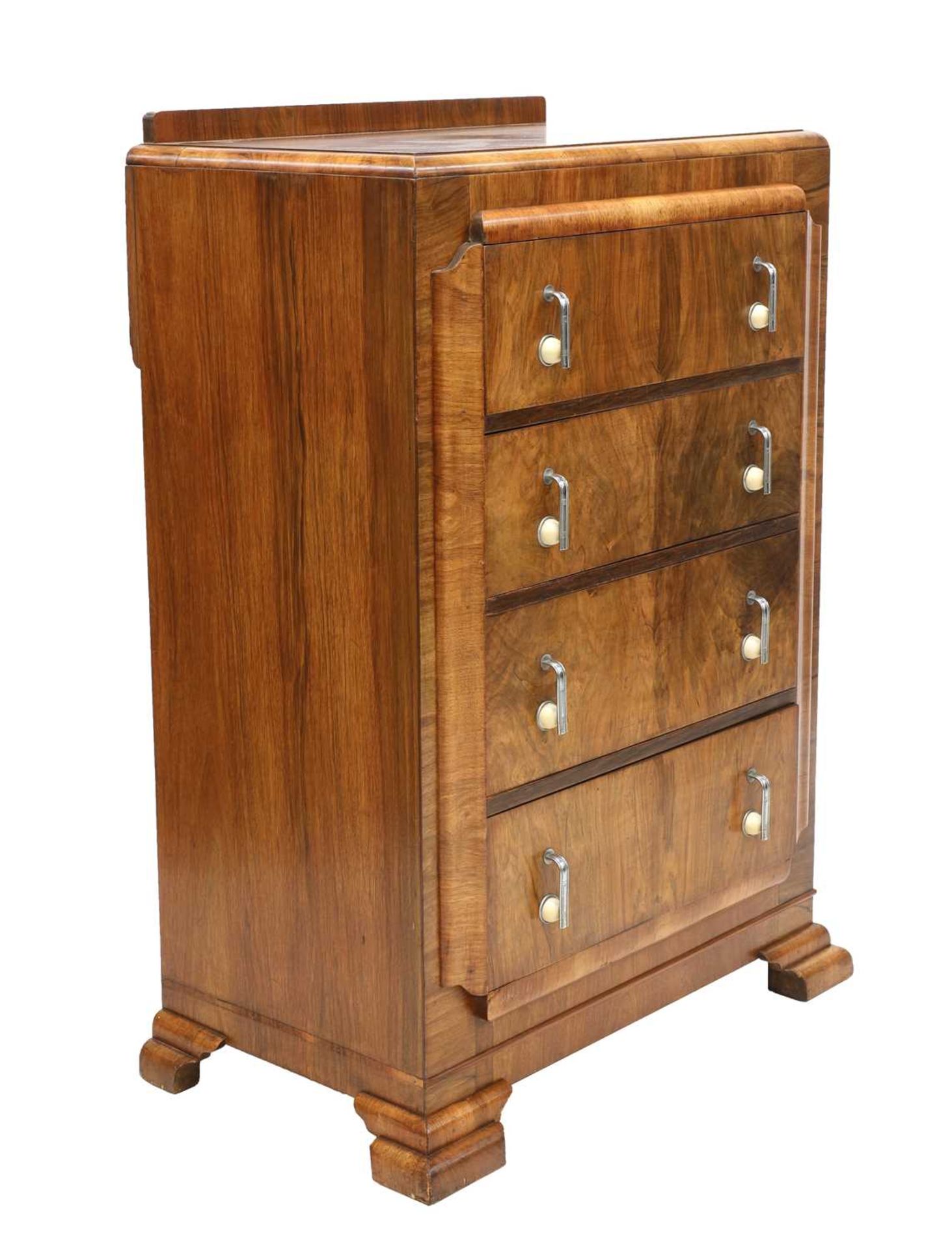 An Art Deco walnut chest of drawers,