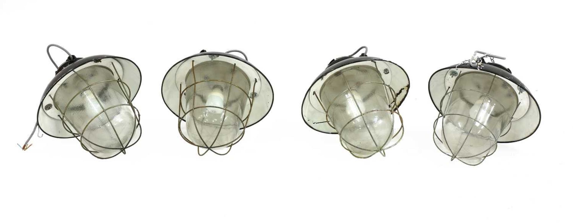 Four Industrial pendant lights,