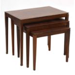 A Danish rosewood nest of three tables, §