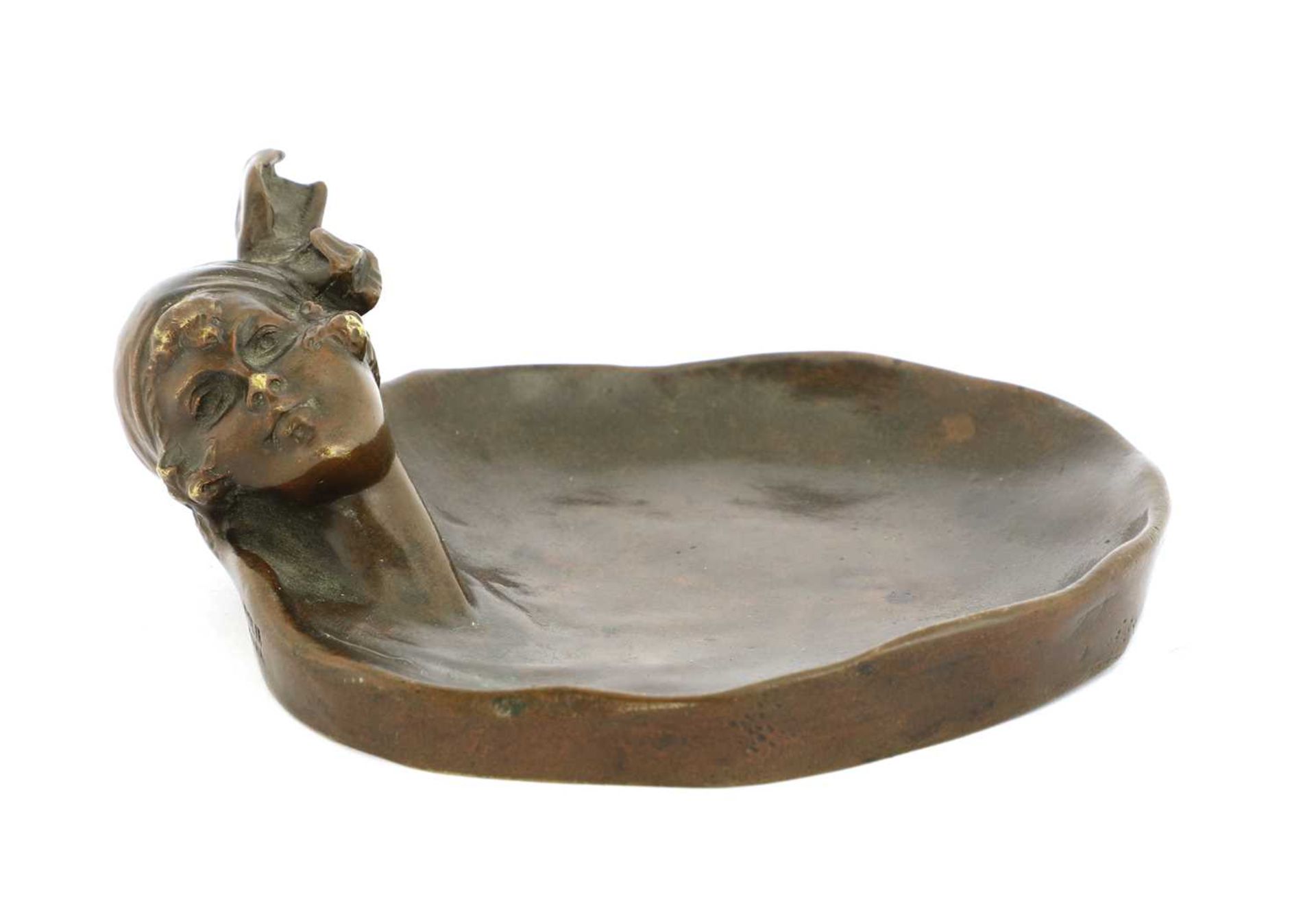 A bronze pin dish,