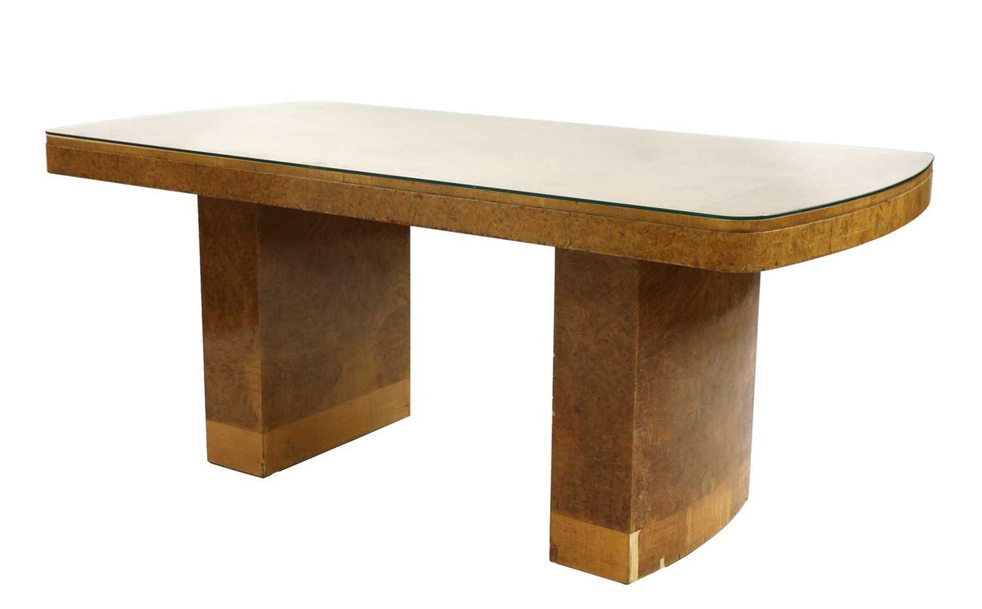 An Art Deco burr maple dining table,