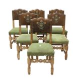 A set of six limed oak dining chairs,
