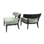 A pair of crescent chairs,