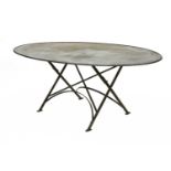 An oval steel folding dining table,