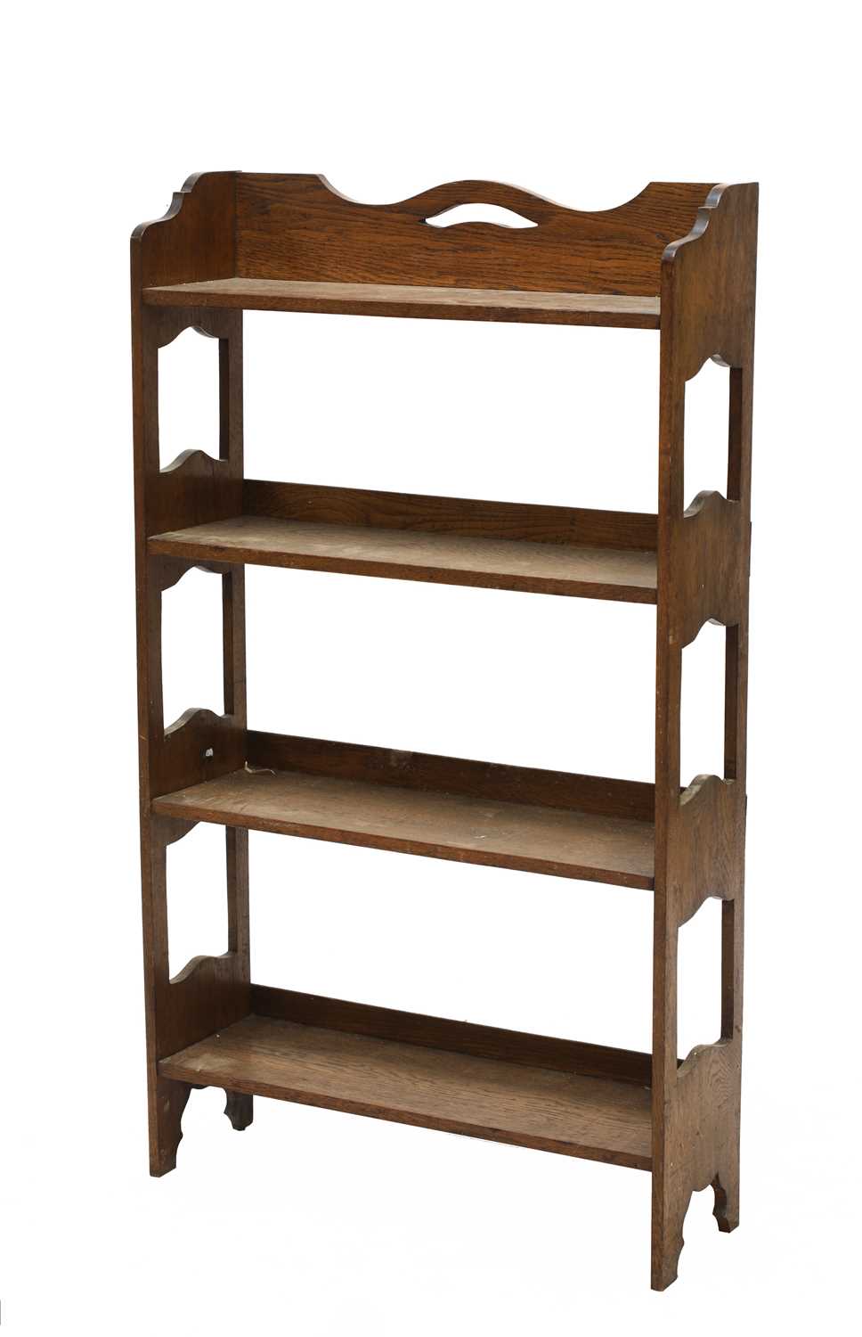 An Arts and Crafts oak free-standing set of shelves,