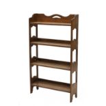 An Arts and Crafts oak free-standing set of shelves,