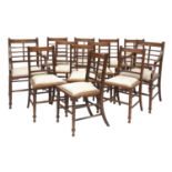 A set of twelve Arts and Crafts walnut chairs,