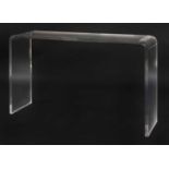 A contemporary Lucite console table,