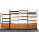 A Staples' teak and satin black metal Ladderax three-section wall unit,