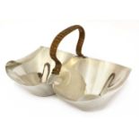 A silver double basket or bonbon dish,