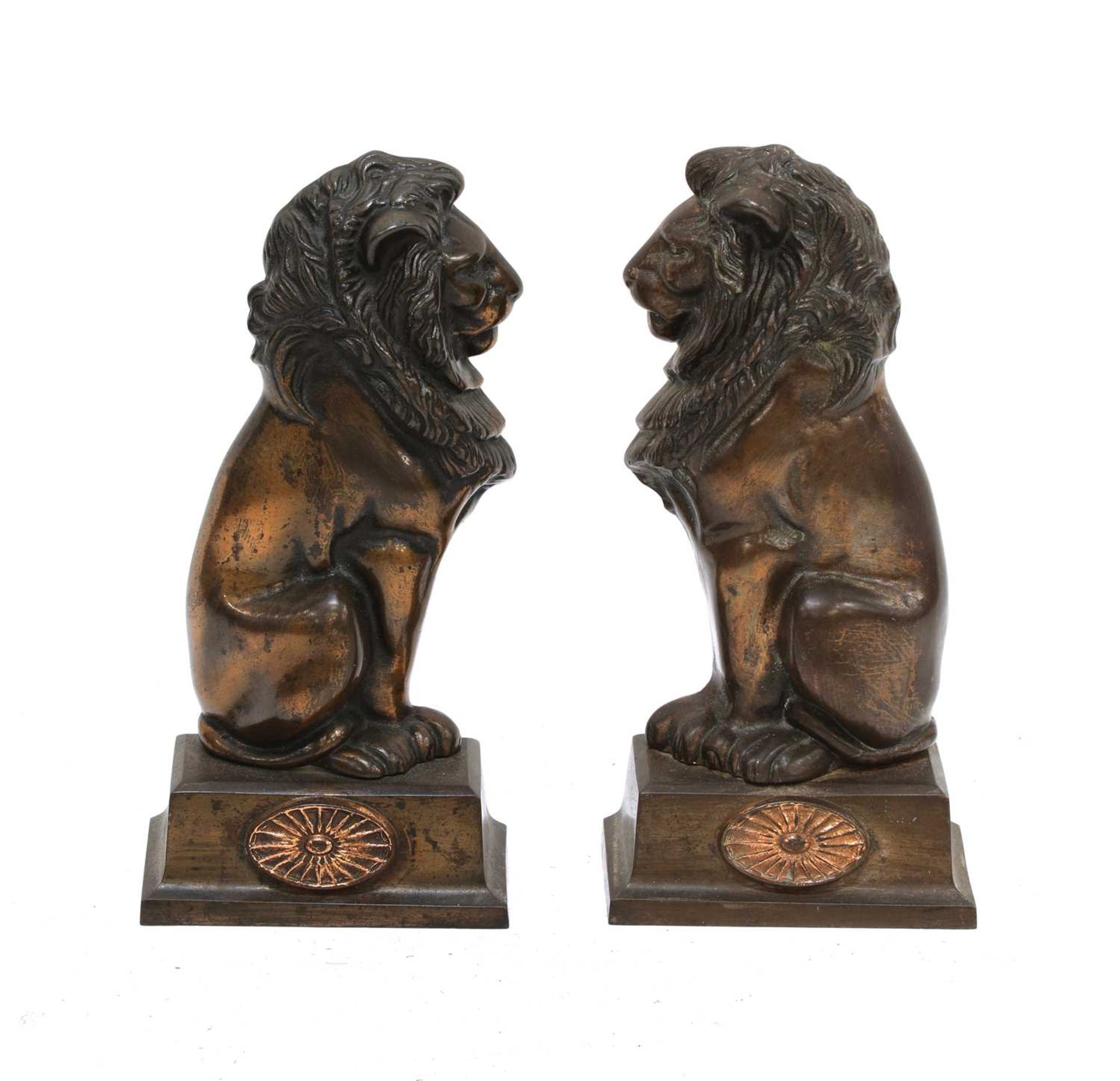 A pair of lion fire dog ornaments,