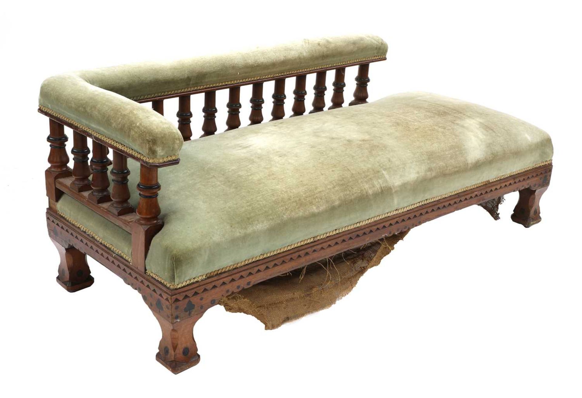 A Victorian Gothic oak and ebonised daybed,