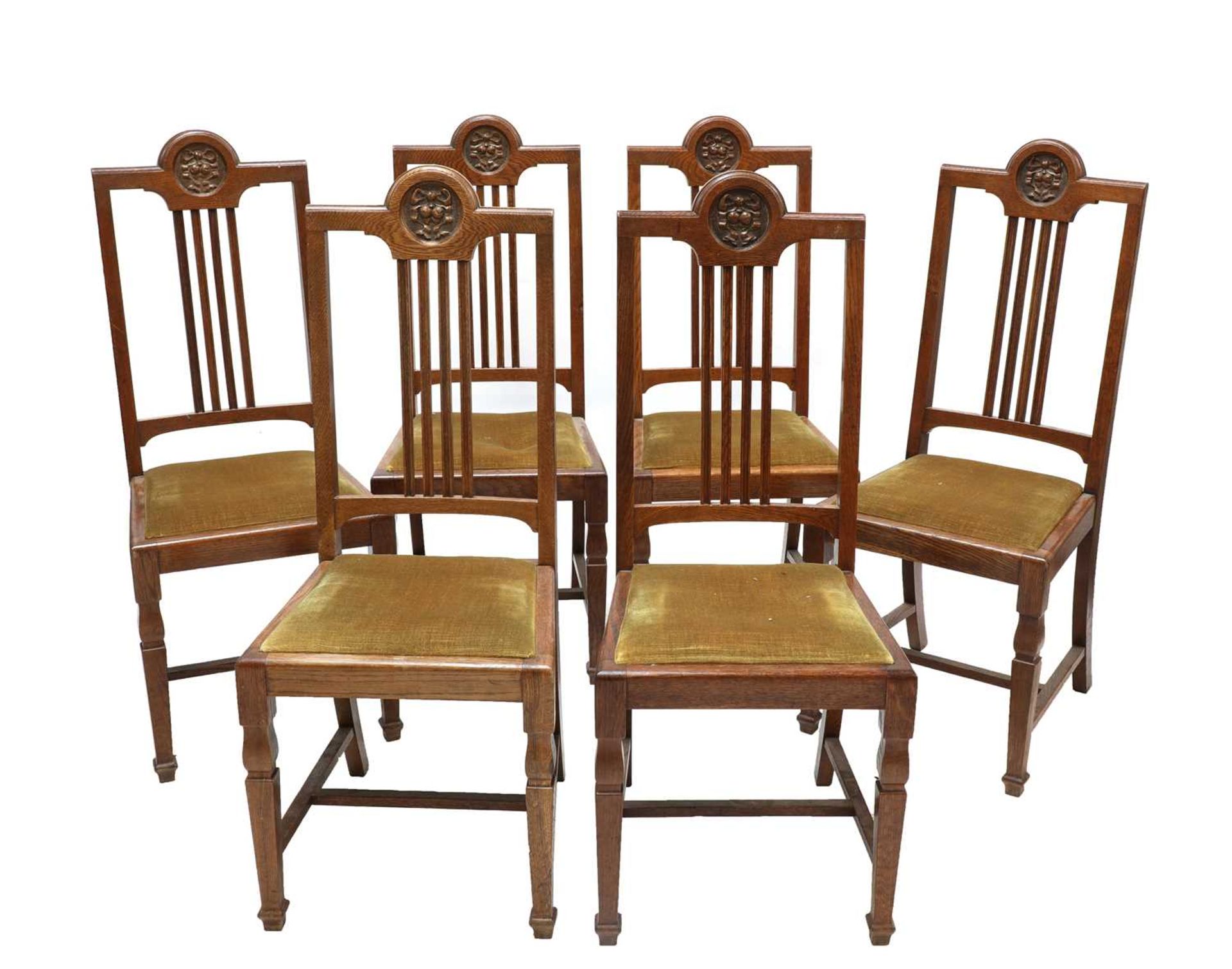 A set of six oak dining chairs,