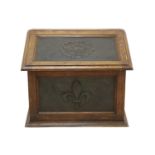 An Arts and Crafts oak and copper-mounted log bin,