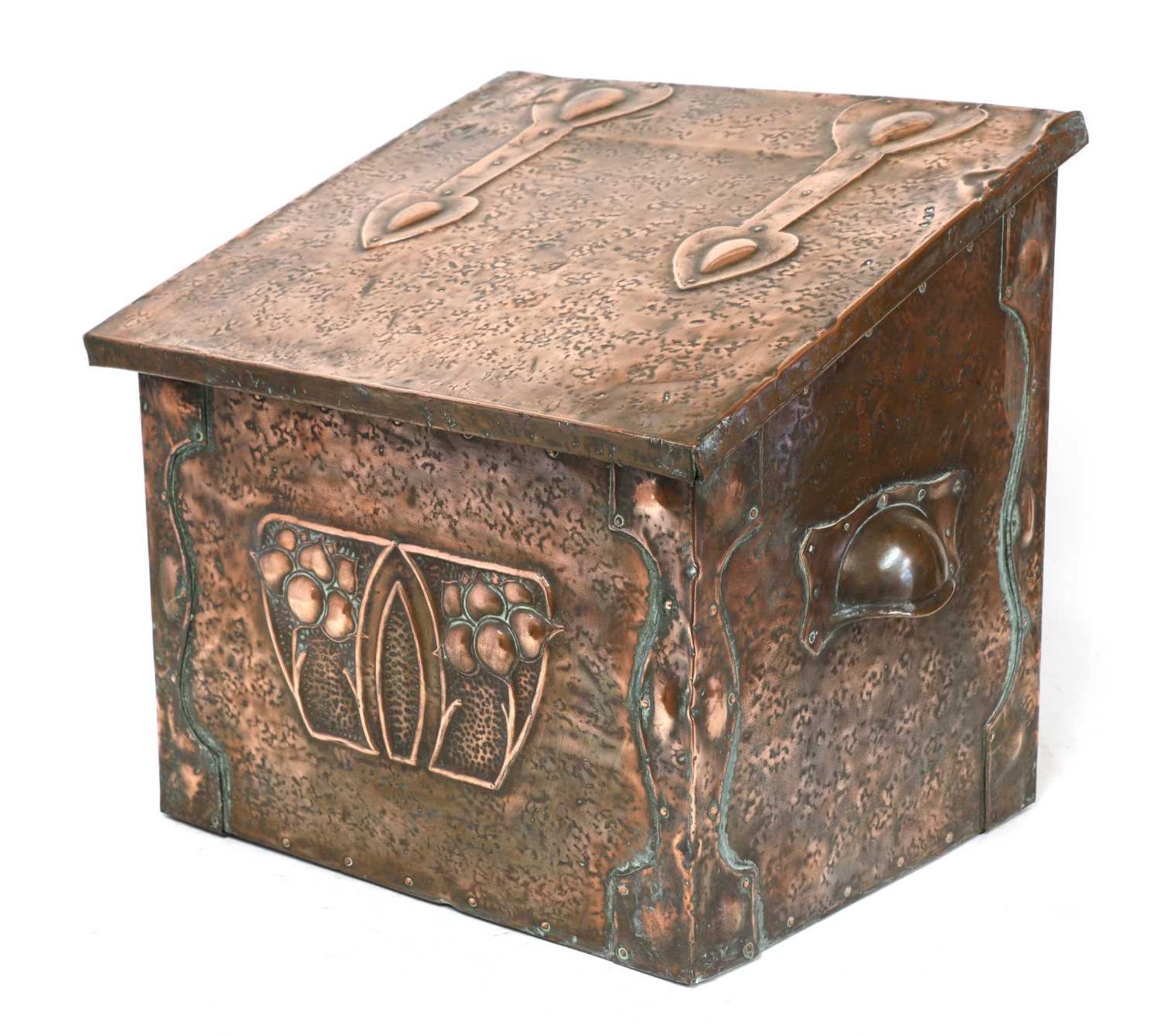 An Arts and Crafts embossed coal box,