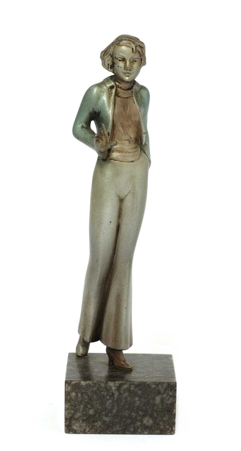 An Art Deco cold-painted bronze figure of a lady,