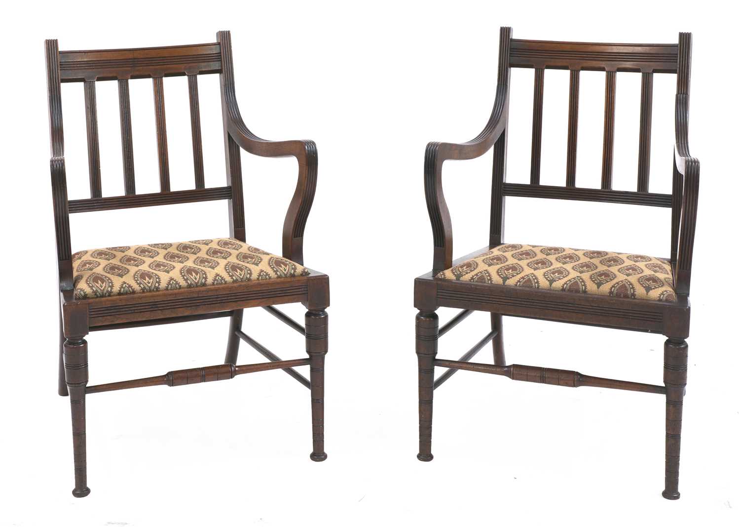 A pair of walnut armchairs,