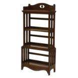An Arts and Crafts oak four-tier open bookcase,