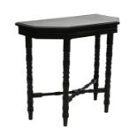 An Aesthetic ebonised side table,