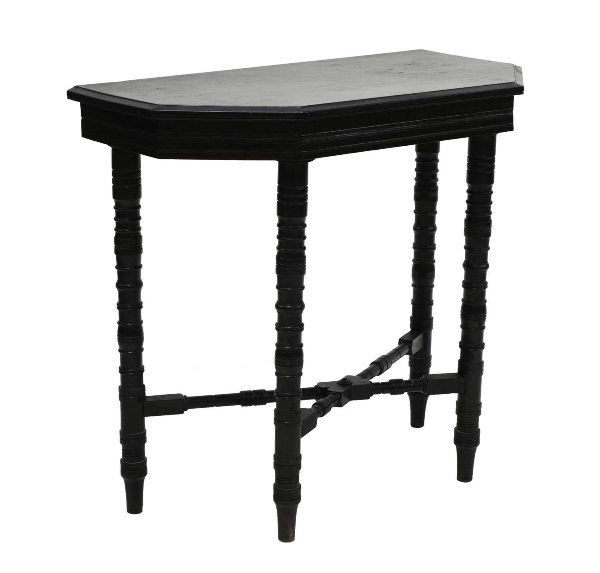 An Aesthetic ebonised side table,