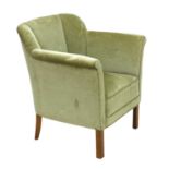A Danish Art Deco green velvet lounge chair,