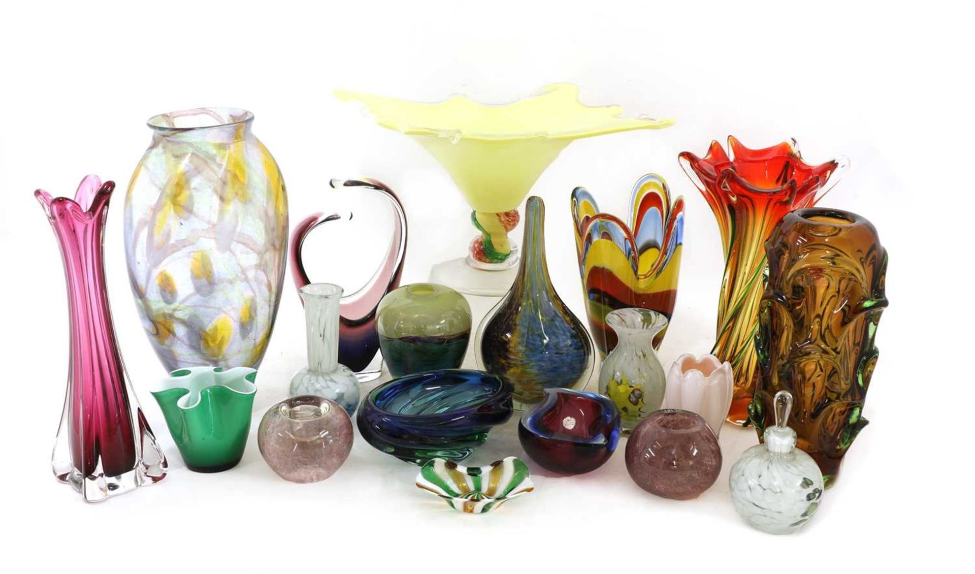 A collection of thirty coloured glass vases and bowls,