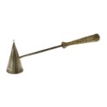A silver gilt candle snuffer,