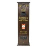 A 'Craven A' cigarette dispenser,
