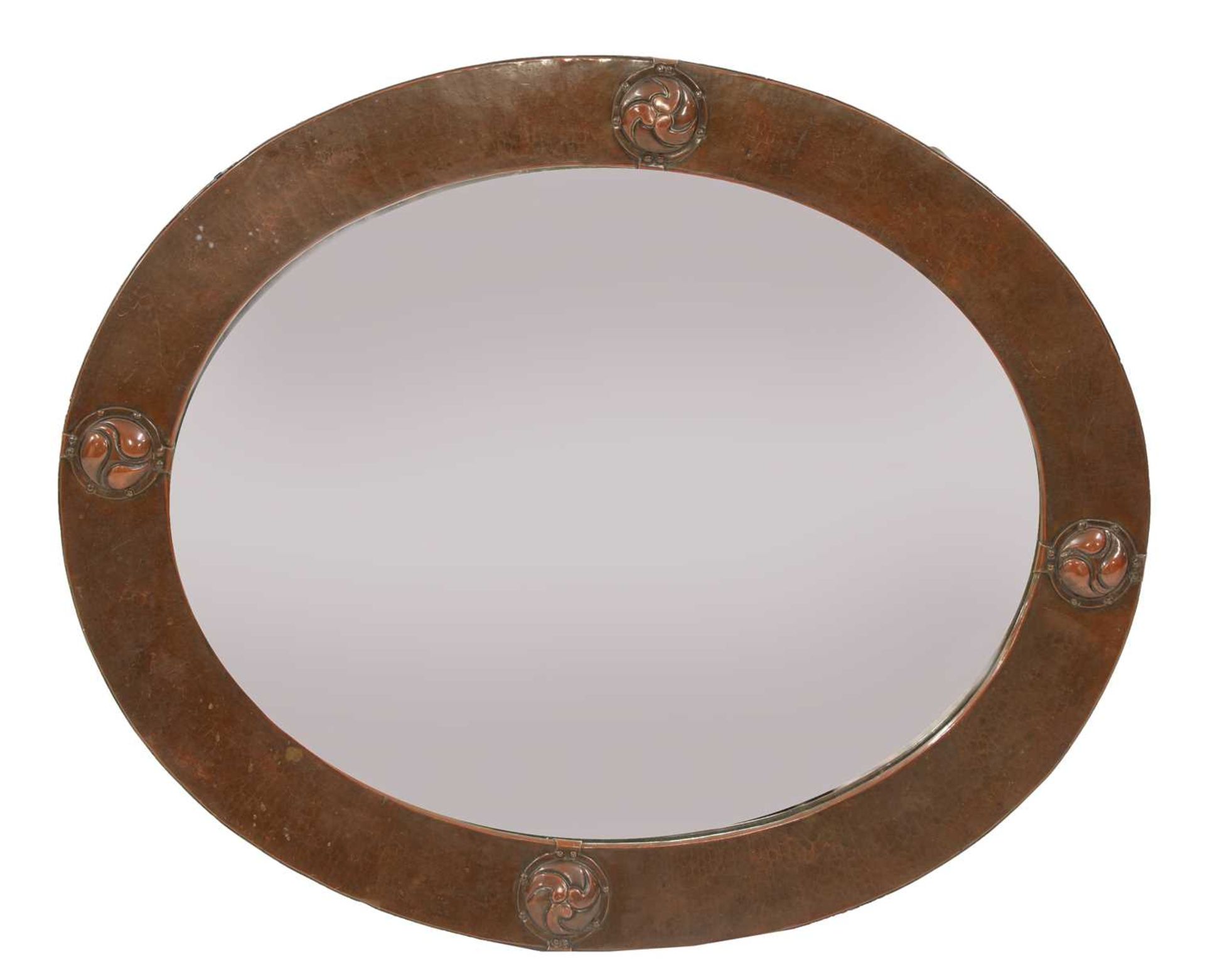 A Liberty oval copper wall mirror,