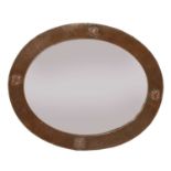 A Liberty oval copper wall mirror,