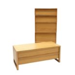 A contemporary oak chest of five drawers,