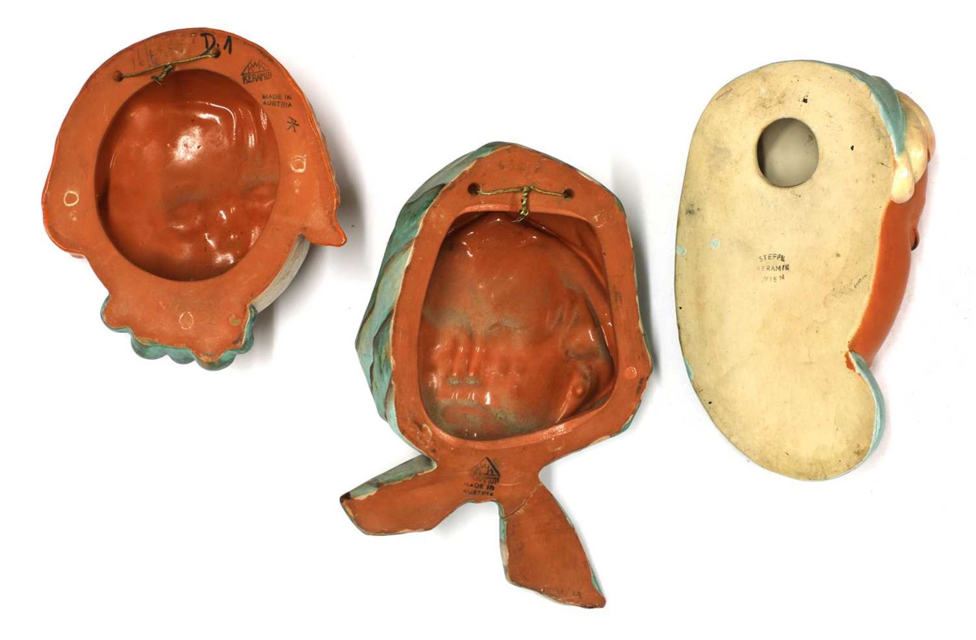 Three Keramos terracotta wall masks, - Image 2 of 2