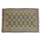 A Scandinavian flat-weave rug,