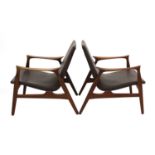 A pair of Danish teak armchairs,