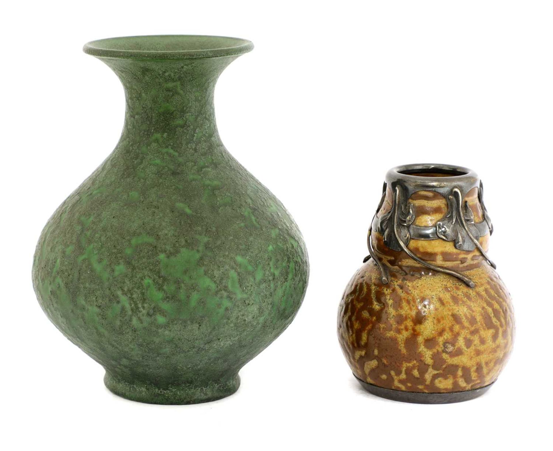A stoneware mottled green glazed vase,
