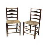 A pair of ash and elm ladderback side chairs,