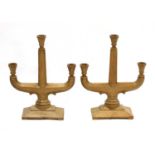 A pair of fruitwood three-branch candelabra,