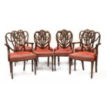 A set of eight Sheraton revival shield back mahogany dining chairs,