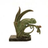 An Art Deco patinated bronze of a chameleon,