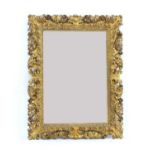 An Italian 19th Century carved giltwood mirror